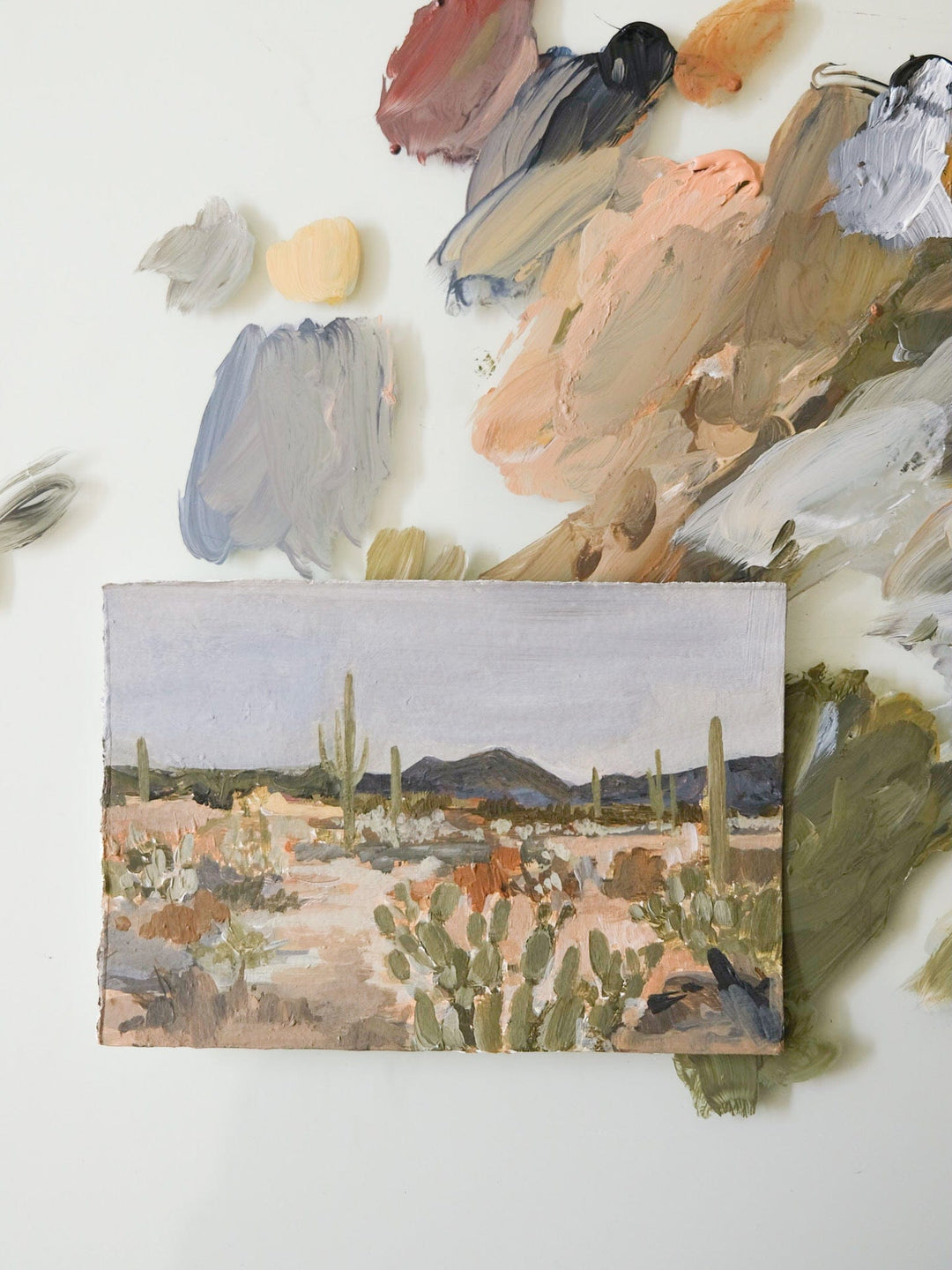 Desert landscape painting with palette