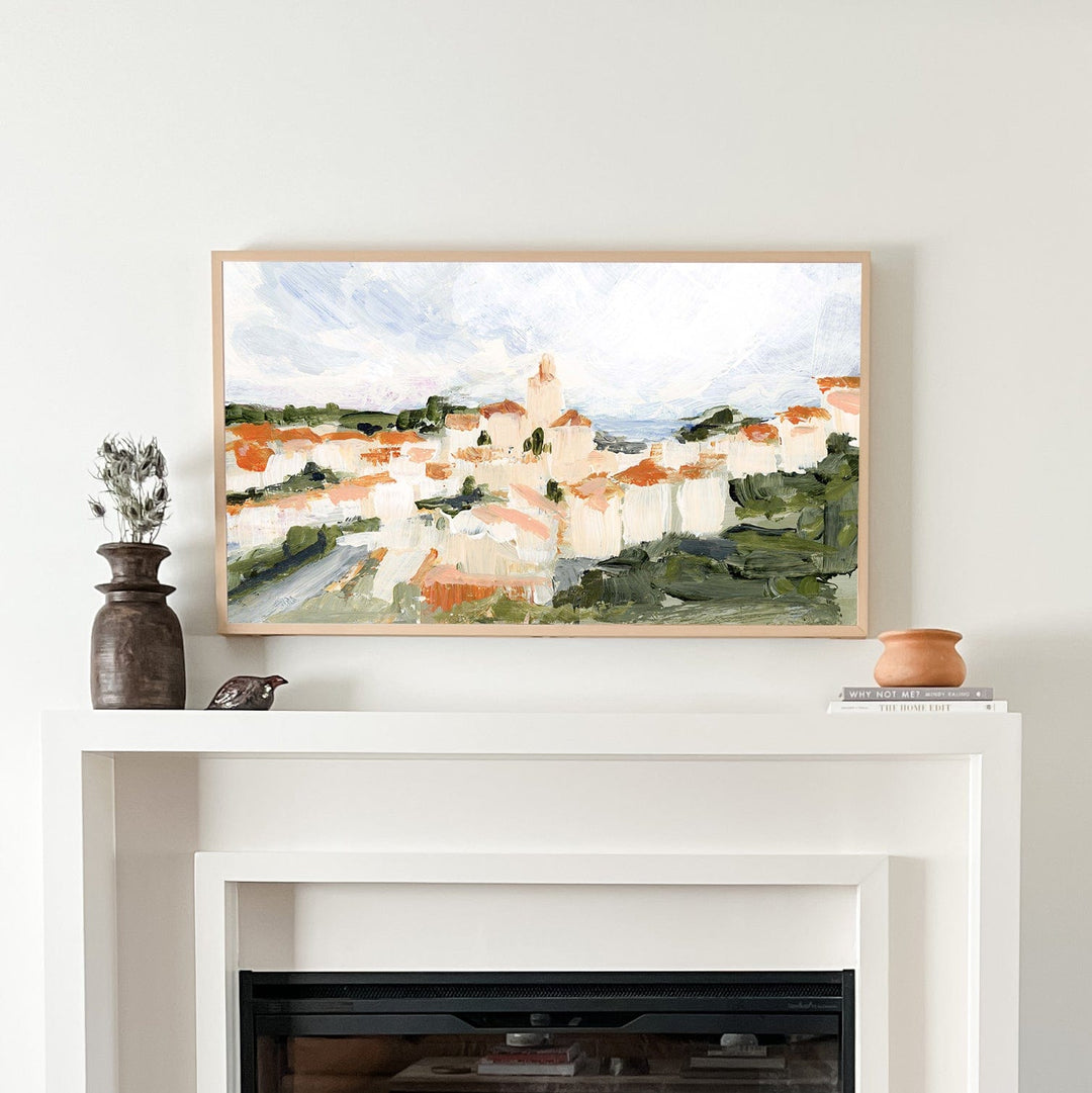 Cadaques fireplace setup with landscape painting