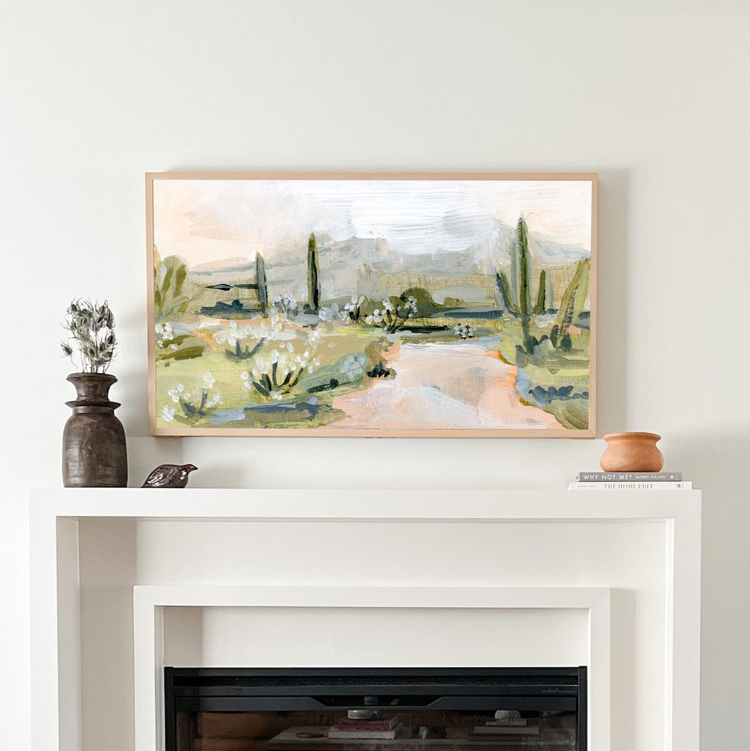 Desert landscape art above fireplace.