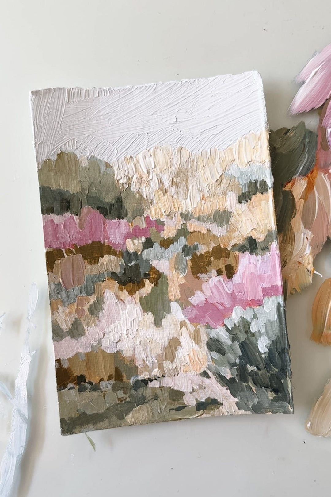 Parilio landscape painting with pink and green brushstrokes