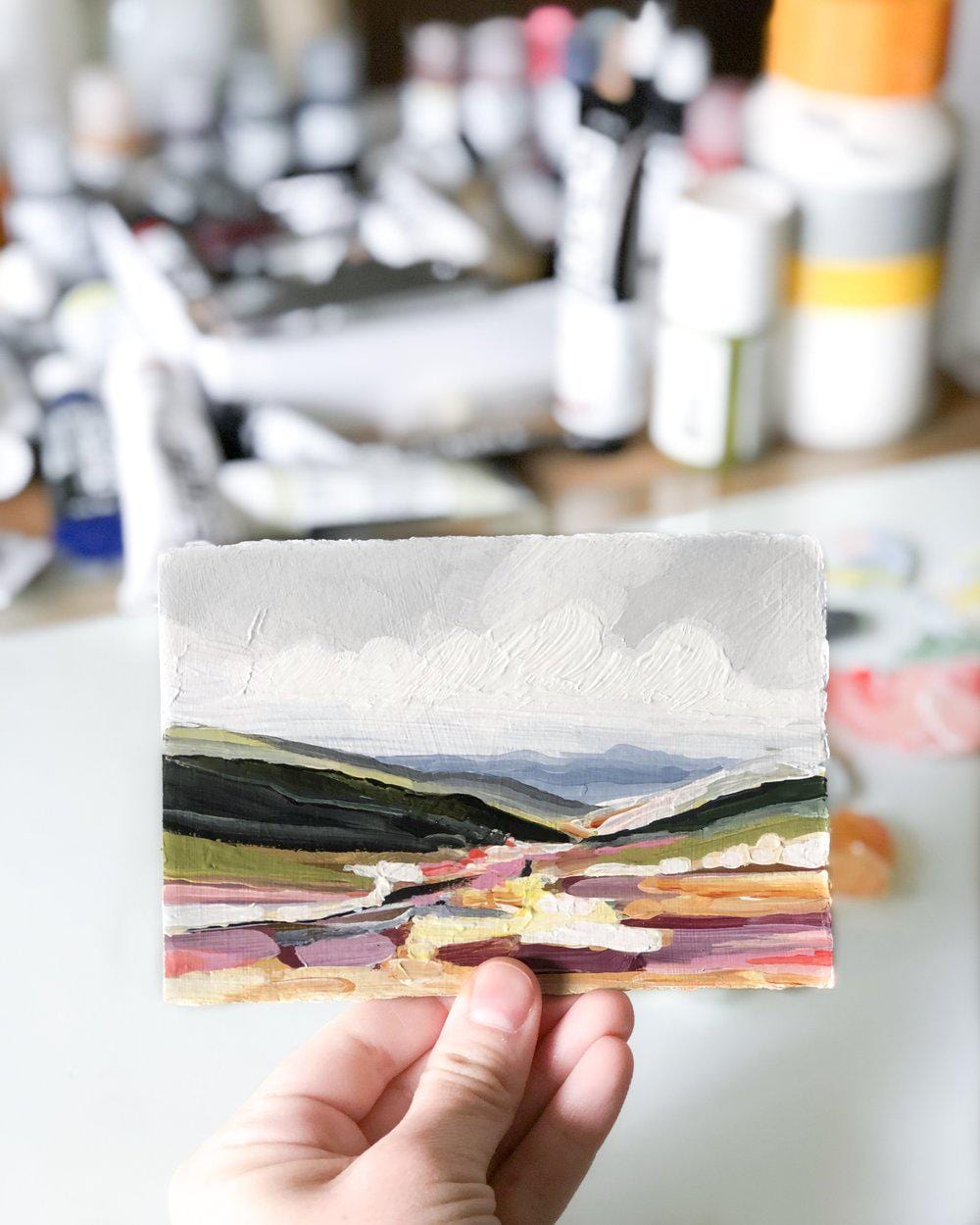 Hand holding landscape painting, IMG_0524