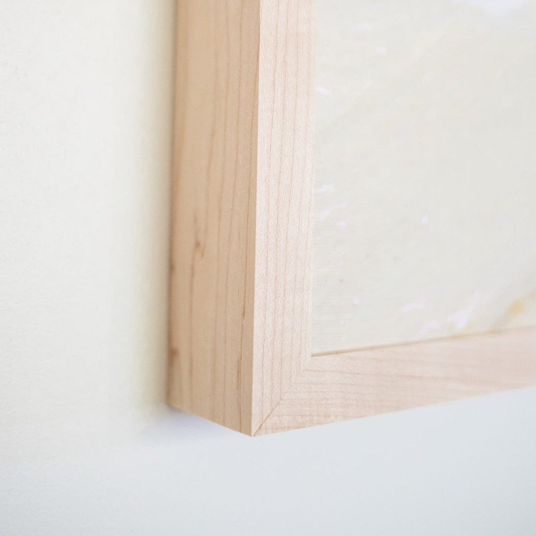 Wooden picture frame on wall.