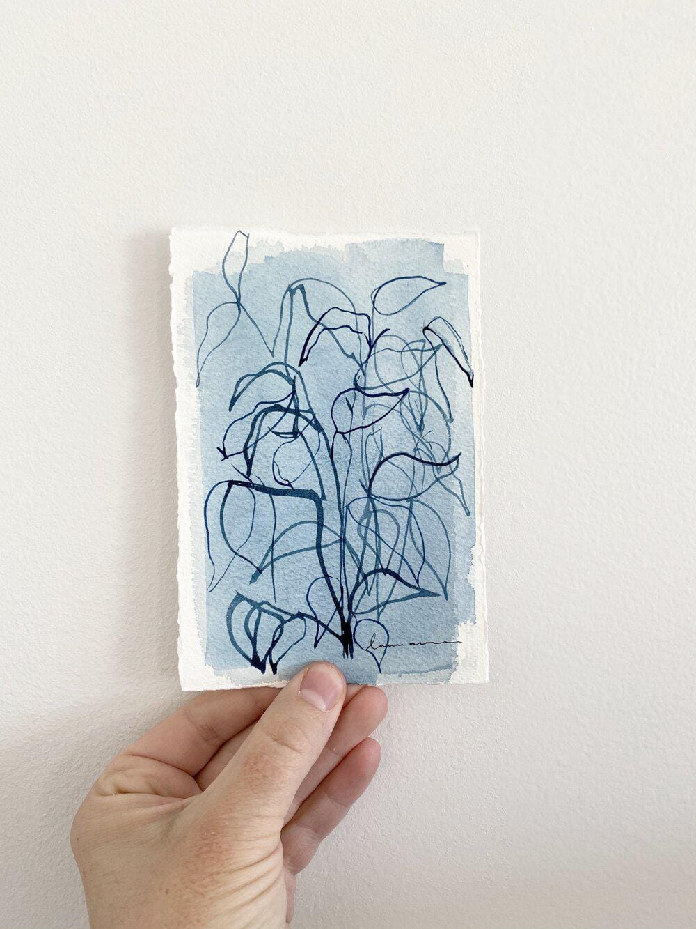 Hand holding blue plant art (IMG_3552)