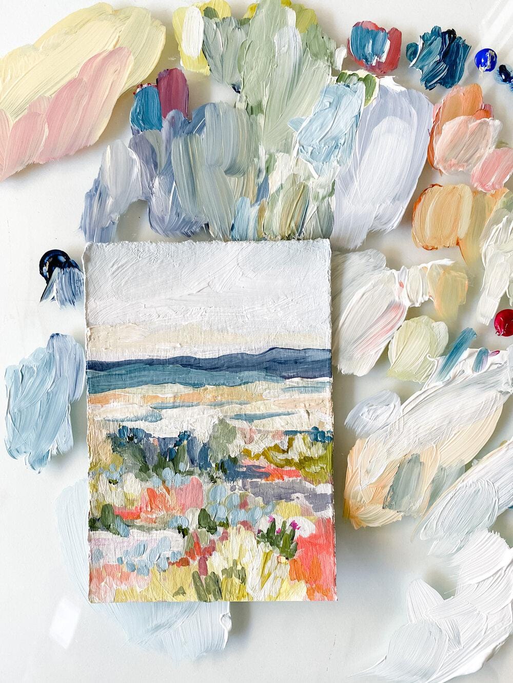 Painting of landscape with paint palette.