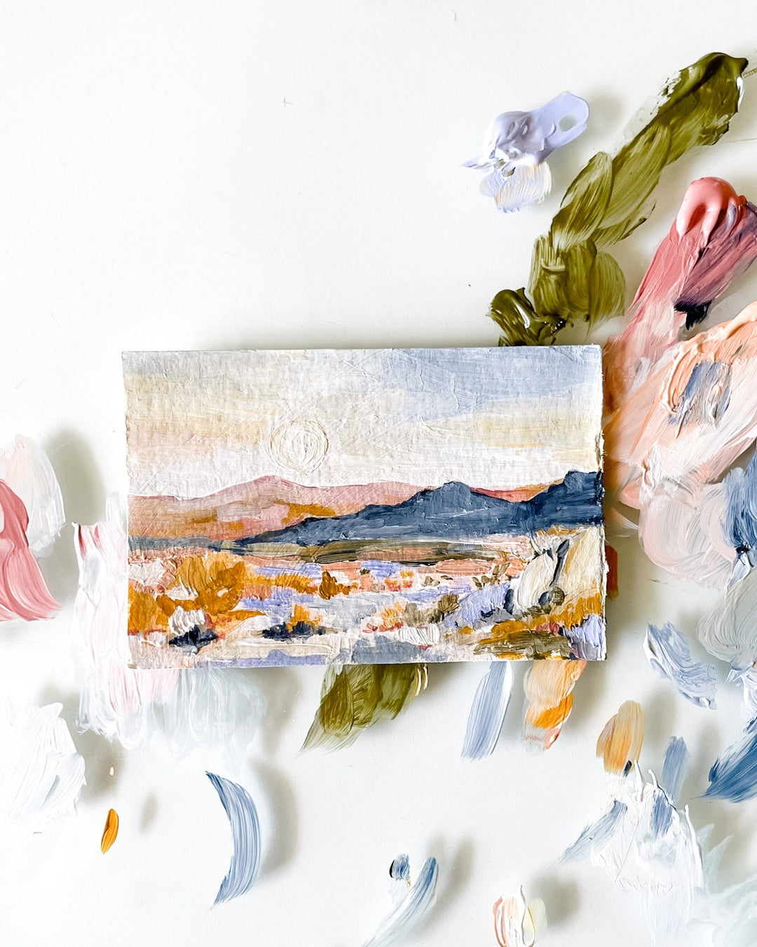 Landscape painting with paint palette.