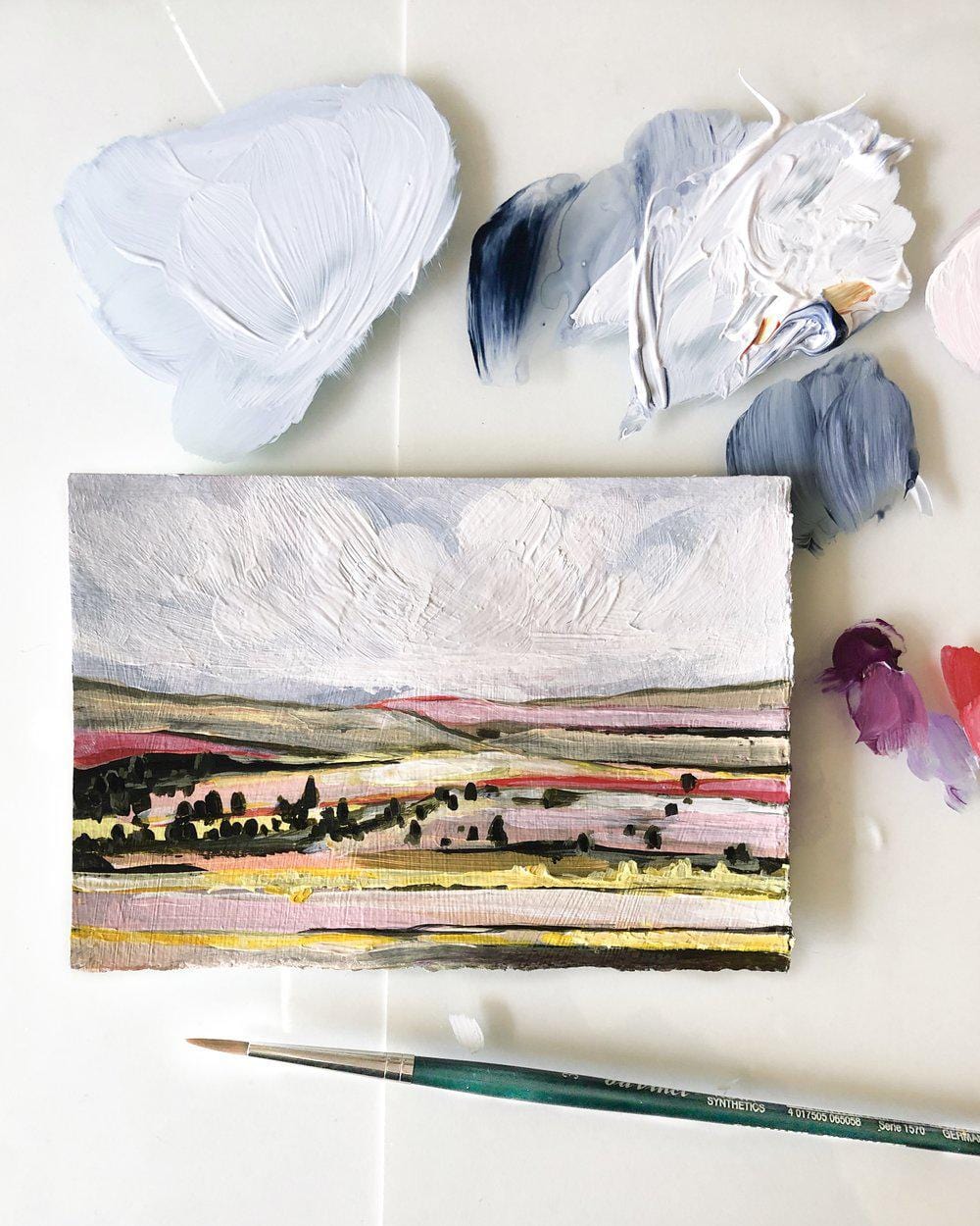 Landscape painting with paint palette
