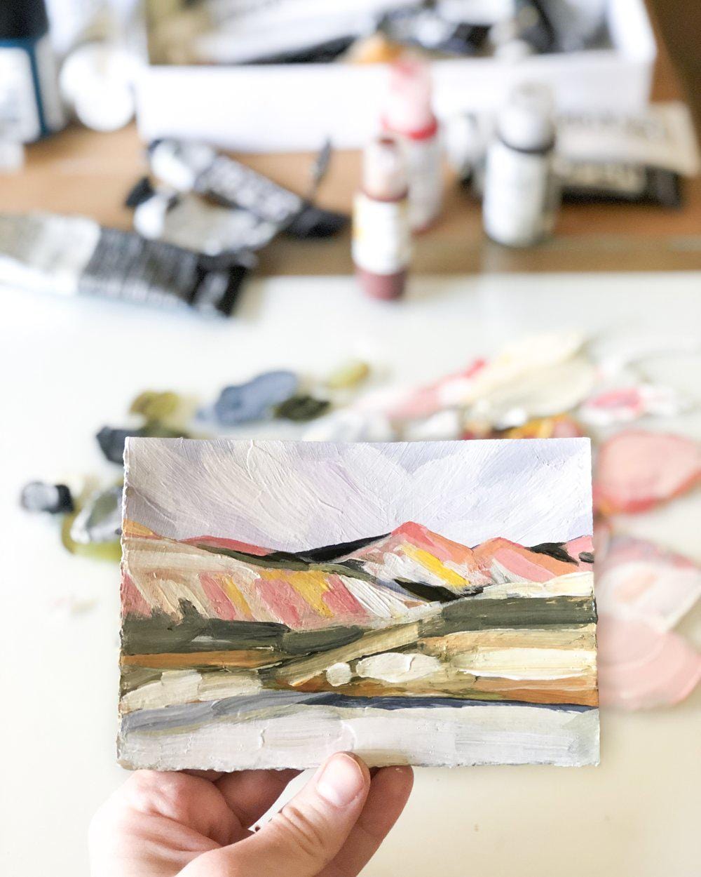 Hand holding landscape painting IMG_8417