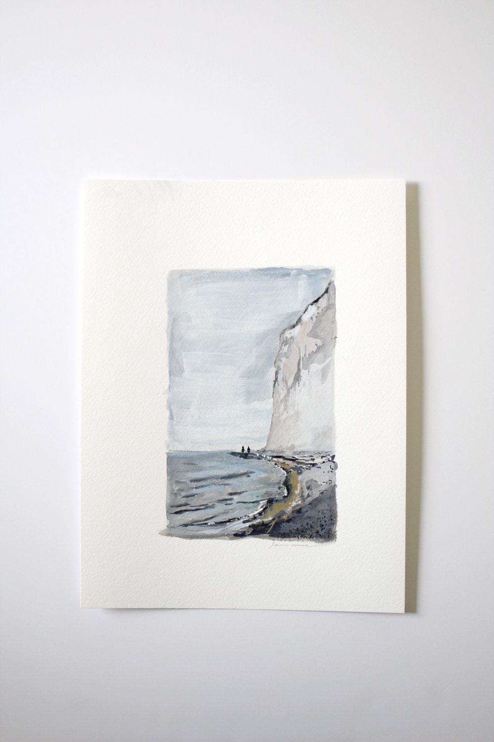 Watercolor painting of coastal cliffs and sea.