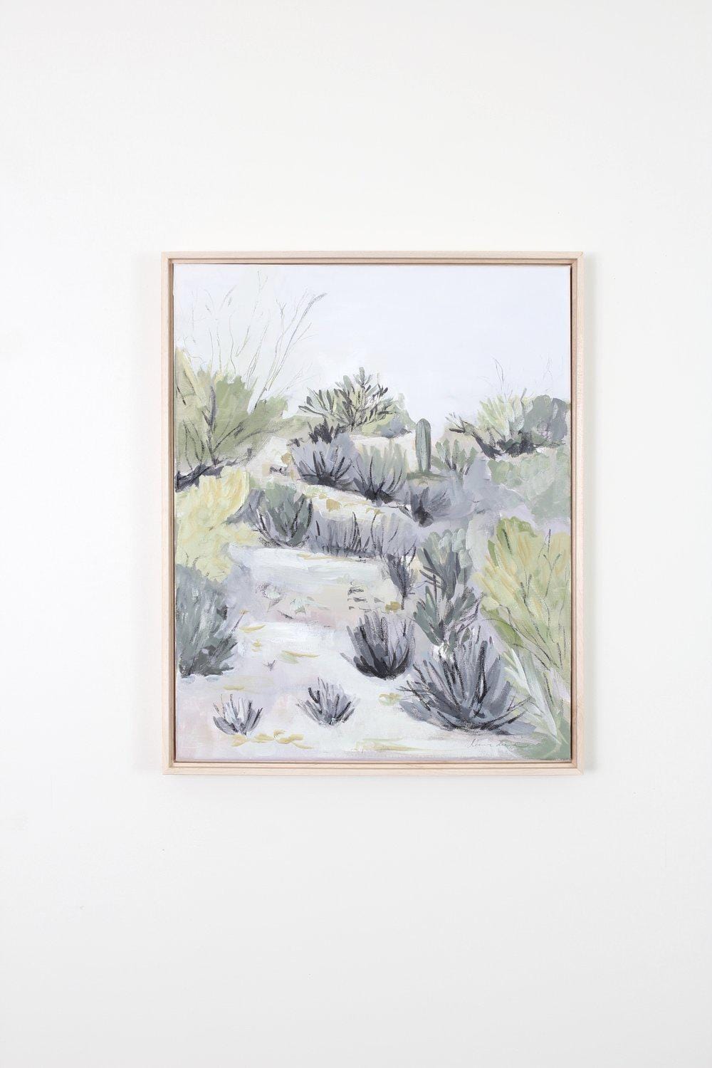 Desert landscape painting in frame