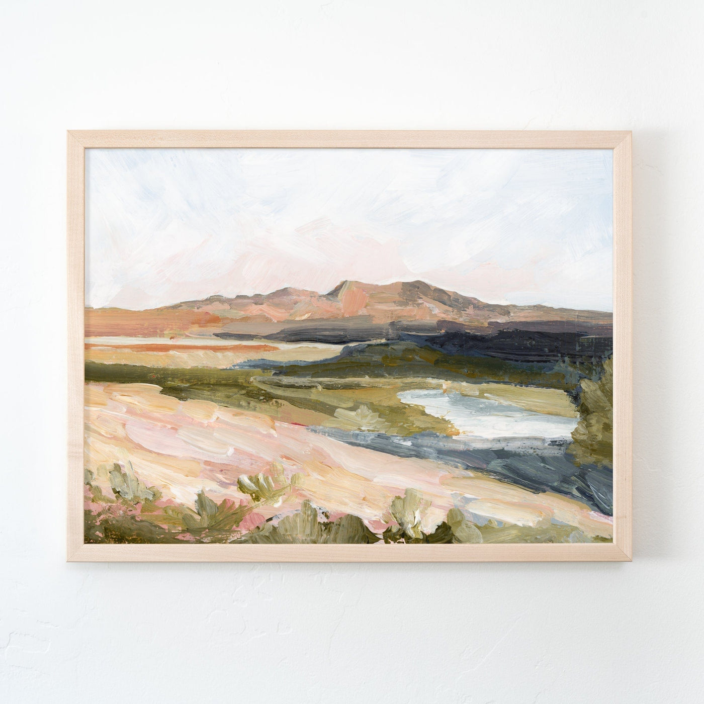 Mountain shadow landscape painting in a frame.