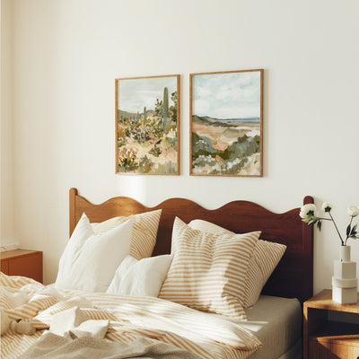Bedroom with wooden headboard, pillows, and wall art